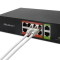 Qoltec Przełącznik sieciowy SWITCH FAST Ethernet PoE | 8x RJ45 |  2x RJ45 Uplink | 120W | 10/100 Mb/s